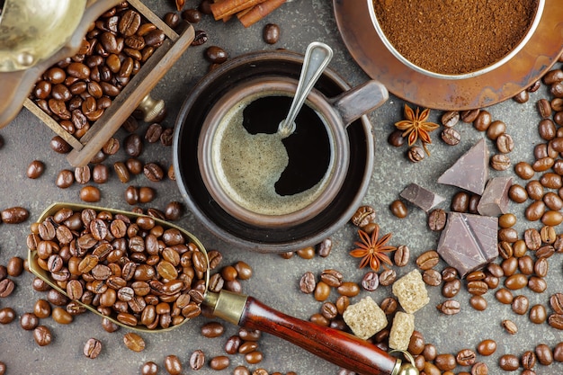 Black coffee beans on an old background