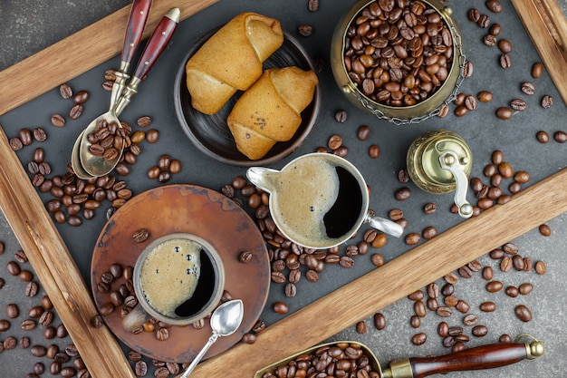 Black coffee beans on an old background