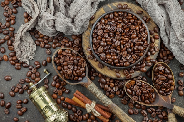 Black coffee beans on an old background