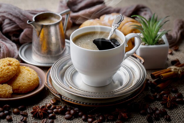 Black coffee beans on an old background