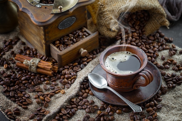 Black coffee beans on an old background