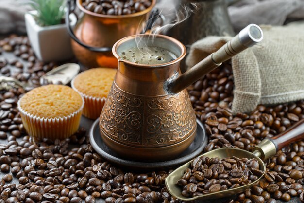 Black coffee beans on an old background