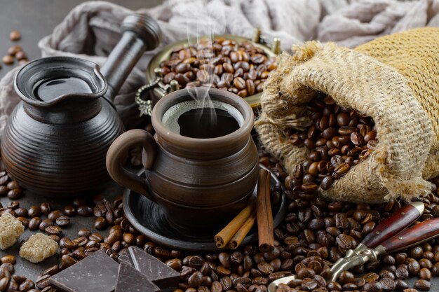 Black coffee beans on an old background