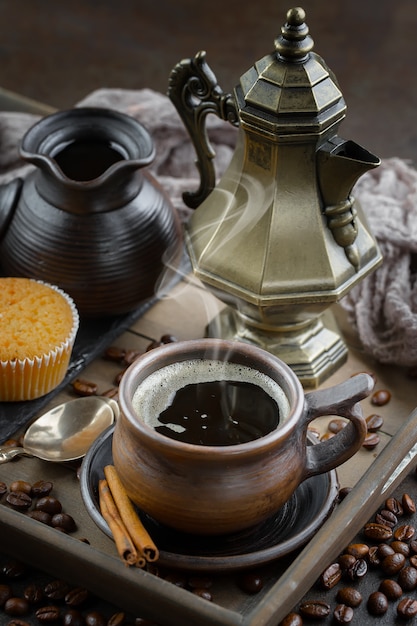 Black coffee beans on an old background