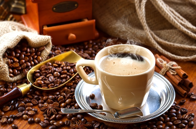 Black coffee beans on an old background