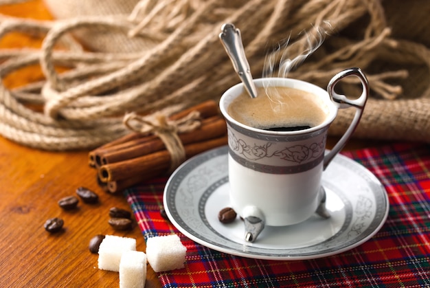 Black coffee beans on an old background