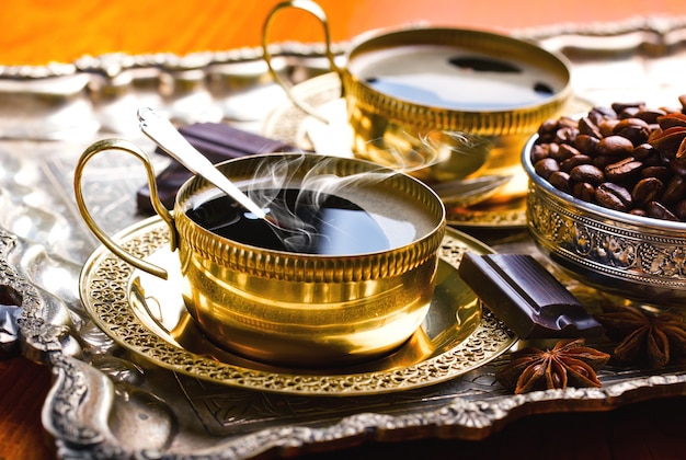 Black coffee beans on an old background