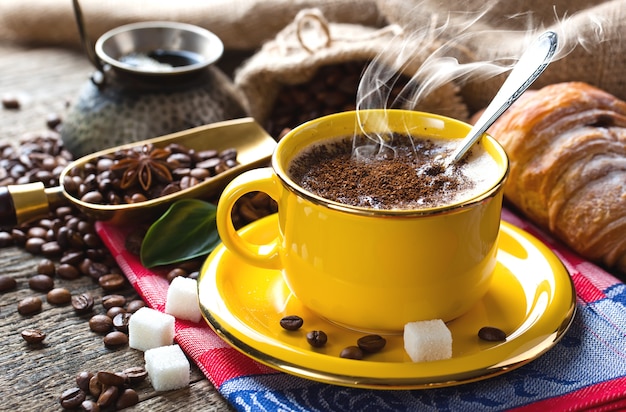 Black coffee beans on an old background