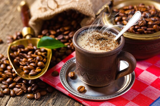 Black coffee beans on an old background