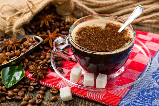 Black coffee beans on an old background