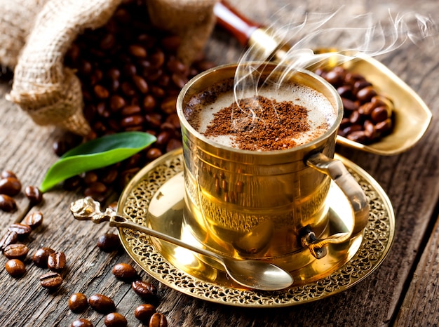 Black coffee beans on an old background