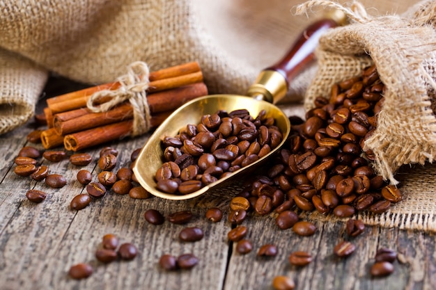 Black coffee beans on an old background