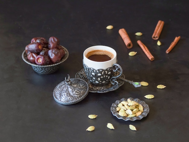 Black coffee with cardamom. Traditional Arabic coffee.