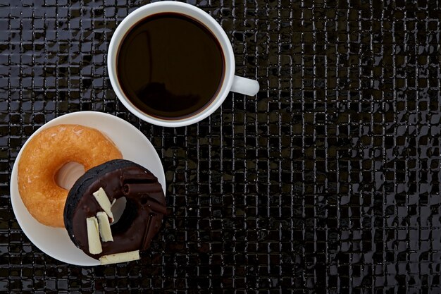 Black coffee with donuts