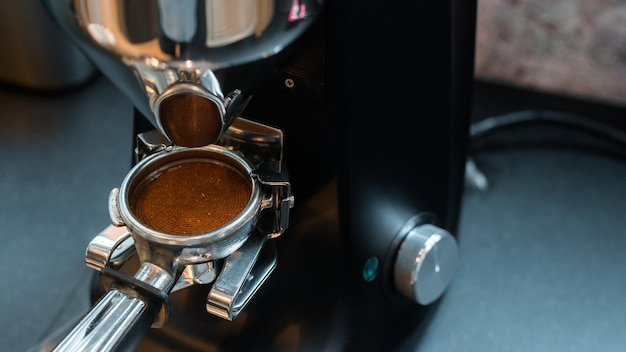 black coffee with milk on a coffee maker