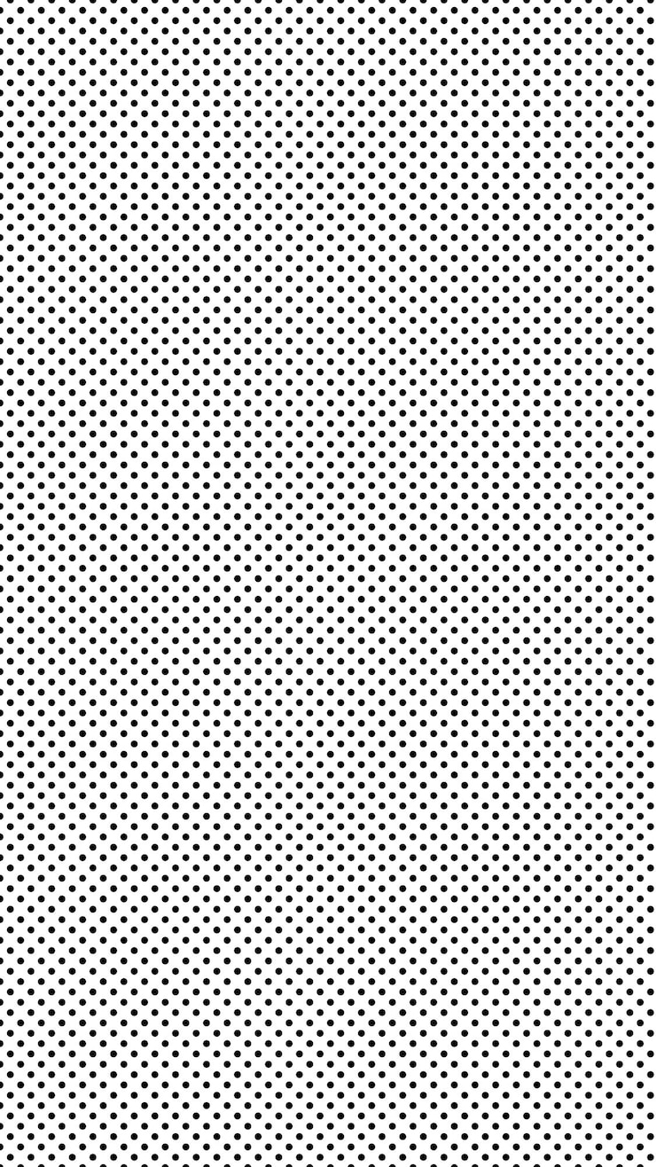 Photo black color polka dots over white background