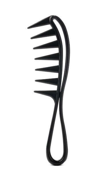 Photo black comb isolated on white background close up