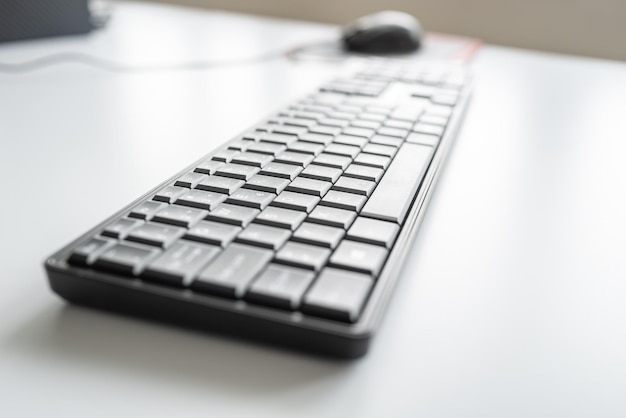 Black computer keyboard and mouse