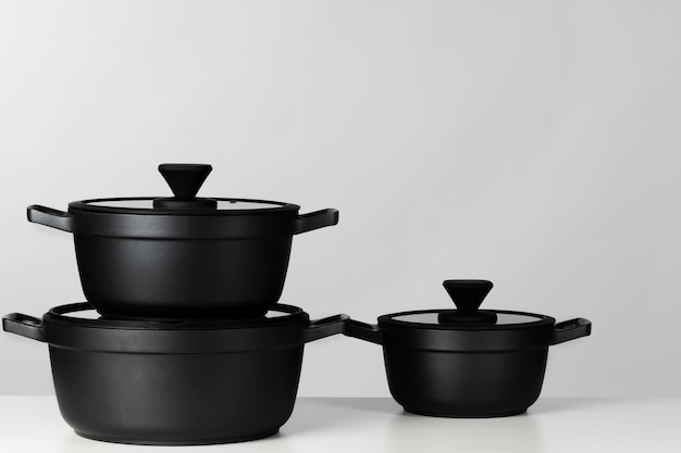 Black cooking pots