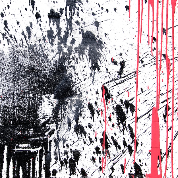 Photo black and coral spray paint for graffiti on a white background