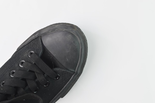 Black cotton shoe isolated on a white background