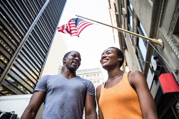 black couple under american flag