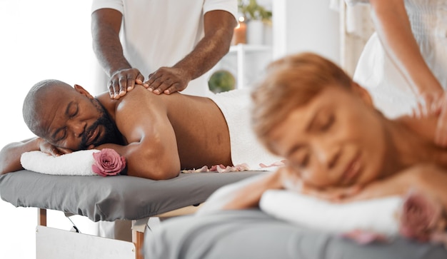 Black couple massage in spa with massage therapist and wellness romantic holiday for stress relief and body care Beauty calm and health with luxury service aromatherapy and body wellbeing