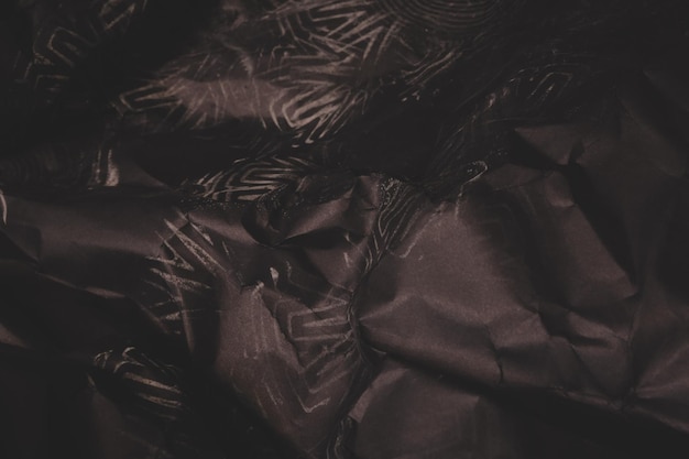 black creased crumpled paper background grunge texture backdrop