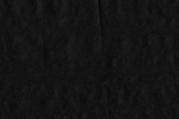 Photo black crumpled paper texture background