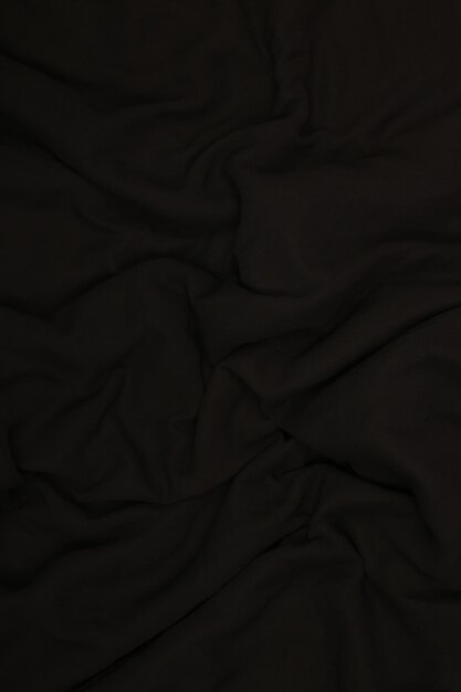 black or dark toned abstract fabric texture for background