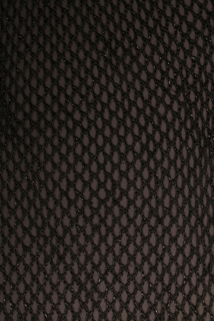 Photo black or dark toned abstract fabric texture for background