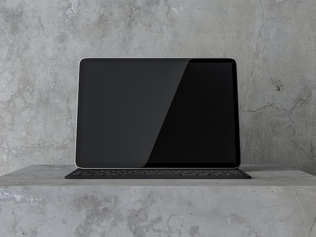 Фото Черный цифровой макет планшета с клавиатурой на бетонном фоне, 3d-рендеринг