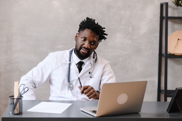 Black doctor. Telemedicine the use of computer