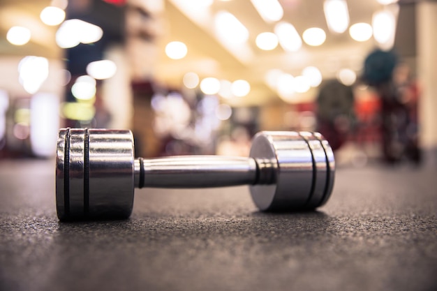 Black dumbbell set at gym exercise concept