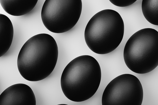 Black easter eggs isolated on white