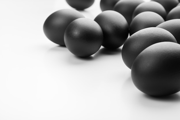 Black easter eggs isolated on white