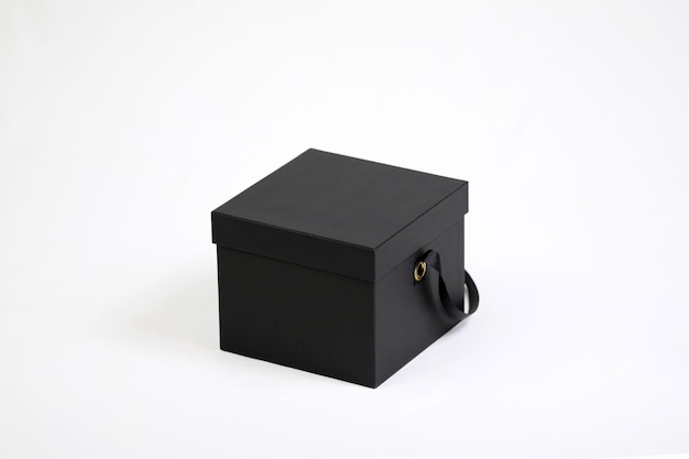 Black empty template square gift cardboard packaging box with closed lid