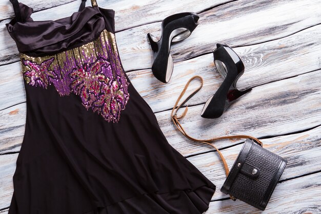 Black evening dress. Dark dress with colorful insert. Girl&amp;#39;s attractive evening look. Garment of high quality silk.