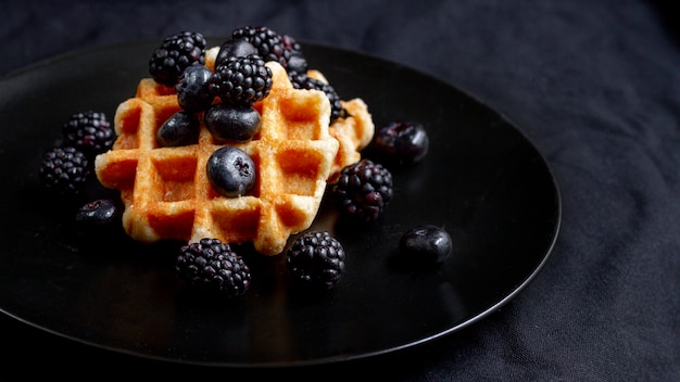 Black forest fruits on waffles