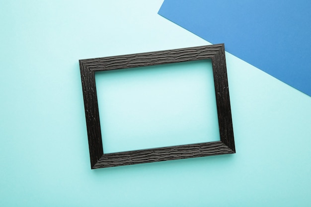 Black frame on blue background.