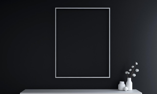 Black frame on a wall with a white vase and a vase on the floor.