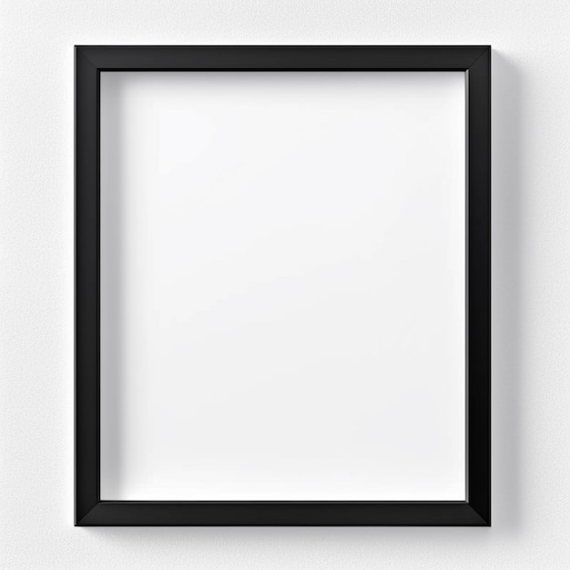 Photo a black framed picture with a white background and a light shadow on the wall.