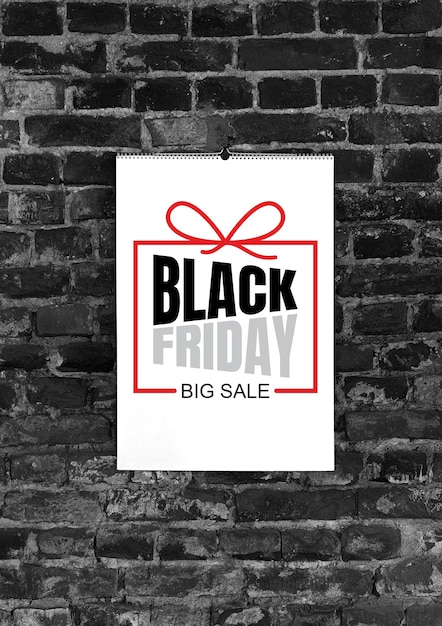 Photo black friday ad on black brick wall background copyspace, negative space for your advertising. black friday, sales, finance, advertising, money, finance, purchases concept.