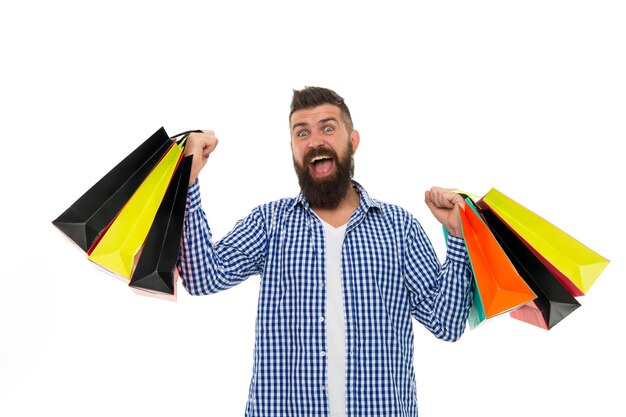 Black Friday Cyber Monday Ongelooflijke tijd tijdens het winkelen Bebaarde man met boodschappentassen Winkelen verkoop Mannelijke kapper zorg Volwassen gelukkig hipster met baard brutale Kaukasische hipster met snor