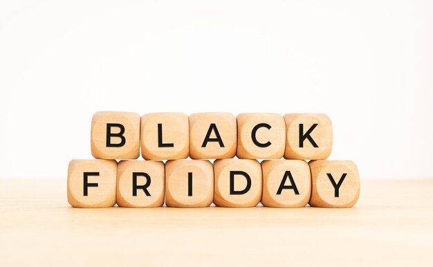 Black Friday phrase on wooden blocks. Copy space