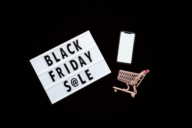 Photo black friday sale flat lay on black background