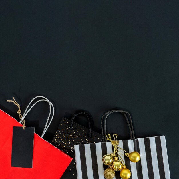 Black Friday shopping bag banner on black background