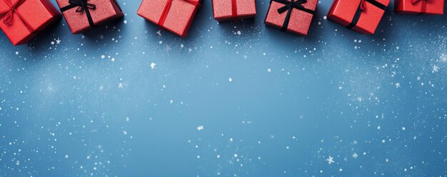 Photo black friday top view christmas boxes with ribbon on blue background with copy space generative ai