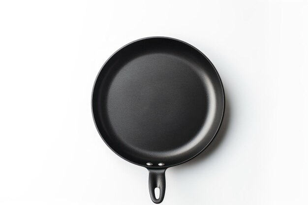 Photo black frying pan on white backdrop