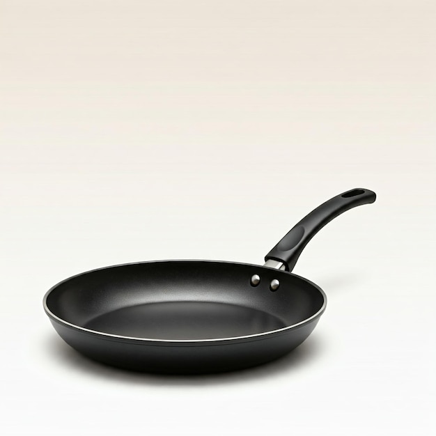 a black frying pan with a handle that says pan on it